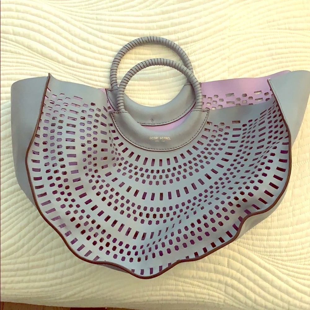Henri Bendel Perforated semi circle tote